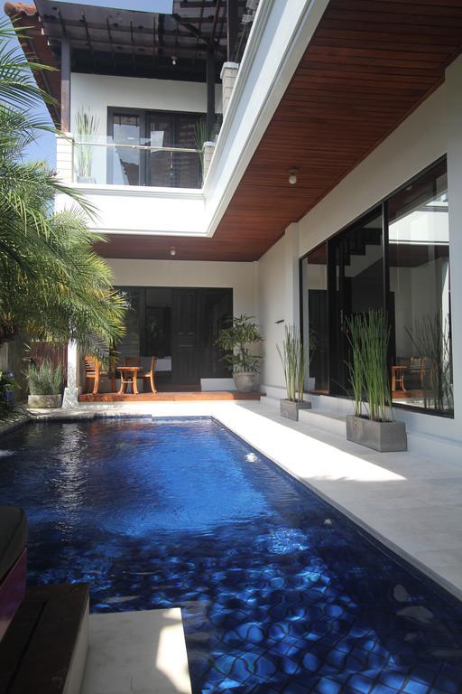 巴厘岛凯迪斯别墅酒店 庫塔 客房 照片